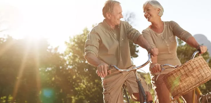 Shot of a senior couple out for a bike ride