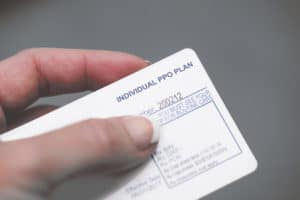 A US health insurance card (Individual PPO Plan)