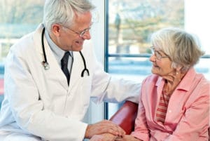 Doctor meeting with a senior patient