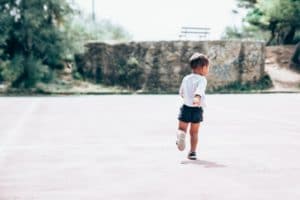 Toddler with developmental coordination disorder running