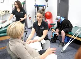 Physical therapists working with patients