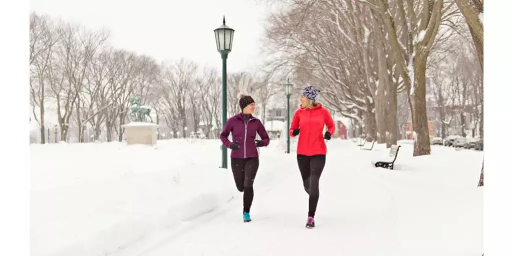 Two friends going on a healthy jog to Preventing Cold Weather Muscle Injuries